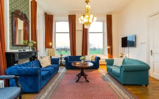Sfeervolle woonkamer van Landhuis Hefswal