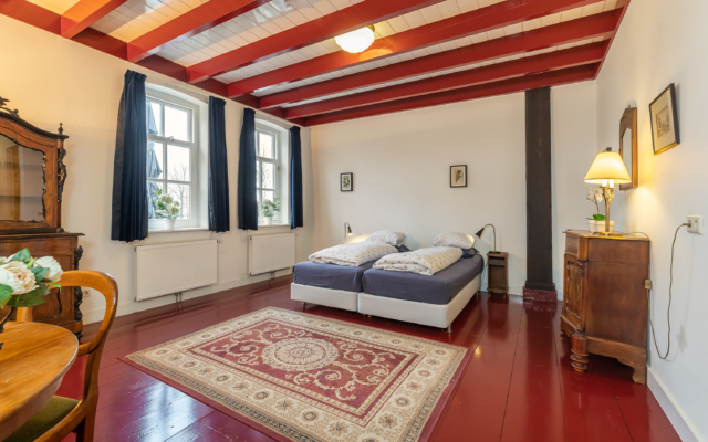 Tweepersoonsslaapkamer met historische details